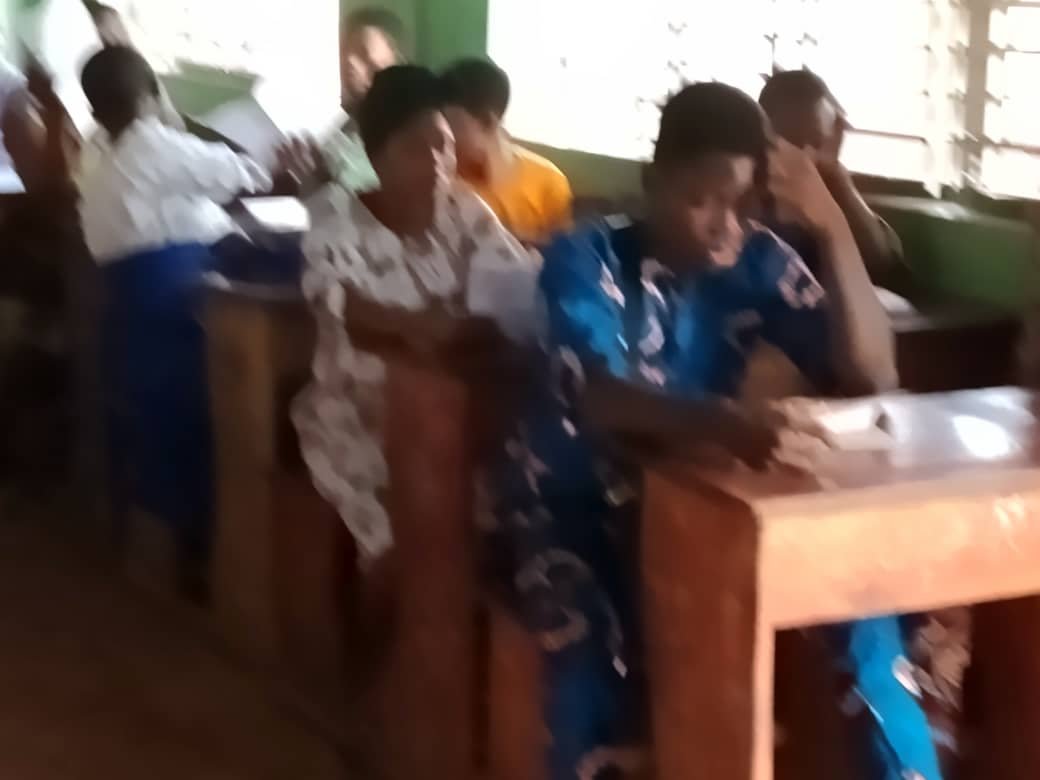 Enumerator collecting data via mobile tablet